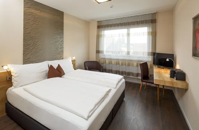 غرفة بسرير مزدوج أو سريرين منفصلين، Villmergen Swiss Quality Hotel 1/10