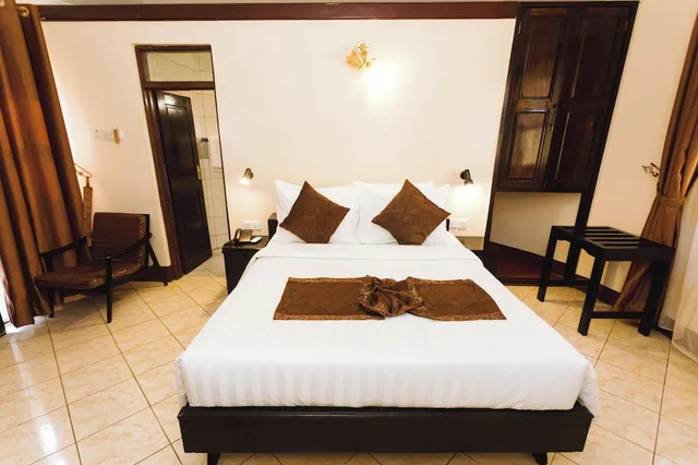 غرفة تقليدية بسرير كينج وسرير فردي، Keys Hotel 5/10