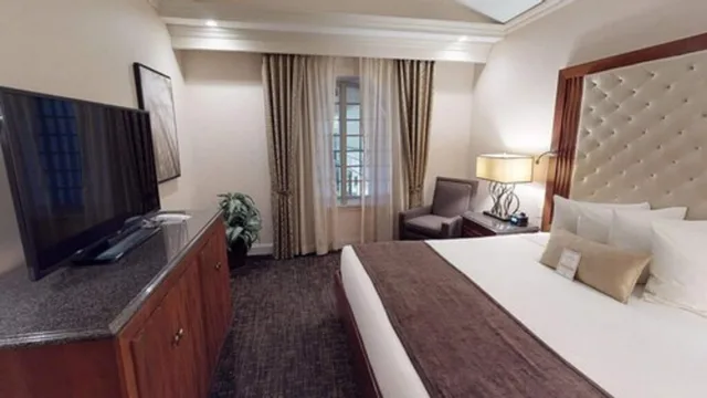جناح بسرير كينج وسريرين كوين مع أريكة بمنطقة جلوس بمطبخ، Eden Resort And Suites, BW Premier Collection 1/8