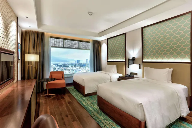 غرفة بسرير فردي بإطلالة على البحر، Hilton Da Nang 1/2