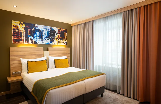 غرفة كومفورت مفردة بسرير كوين، Leonardo Boutique Hotel Salzburg Gablerbrau 1/3