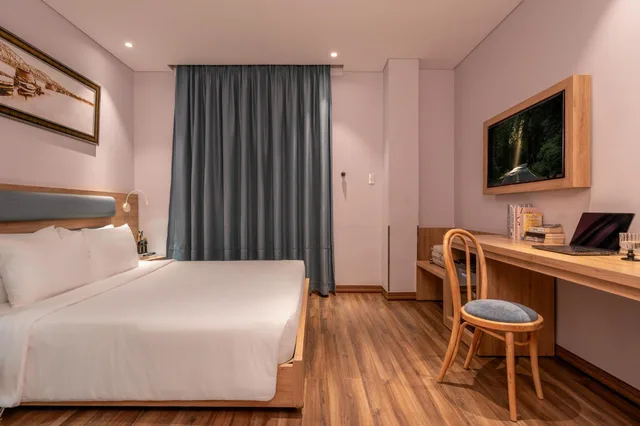 Deluxe, Queen Bed, No Window، Adora Mira Hotel (formerly Ramada Encore By Wyndham Saigon D1) 1/9