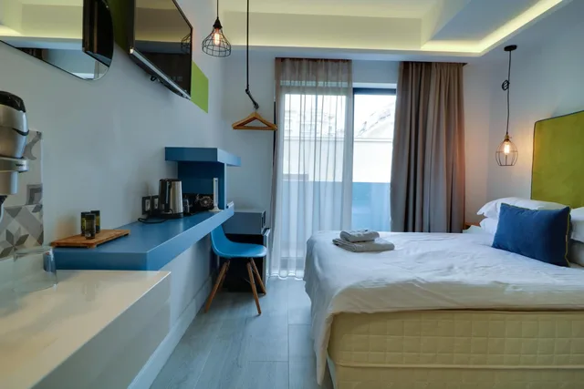 غرفة ديلوكس مفردة بشرفة، Blue Bottle Hotel 3/10