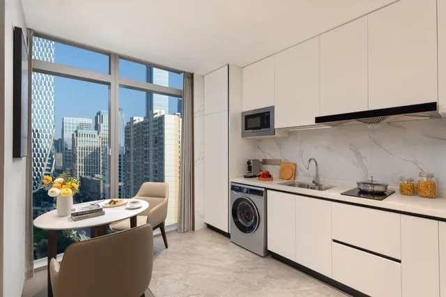 استوديو بريميير بسرير كينج، Ascott Pazhou Guangzhou 1/4