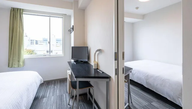 غرفة متصلة بسريرين منفصلين، R B Hotel Sendai Hirose Dori Ekimae 1/1
