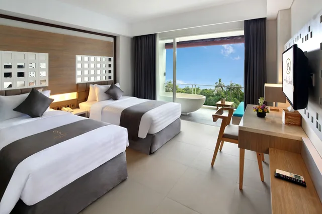 غرفة ديلوكس بسرير مزدوج أو سريرين منفصلين بحوض استحمام، Jimbaran Bay Beach Resort & Spa by Prabhu 2/4