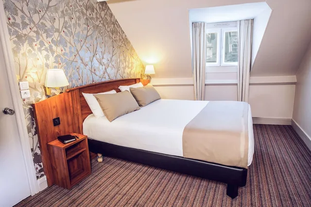 غرفة كومفورت بسرير كوين، TIMHOTEL LE LOUVRE 1/10