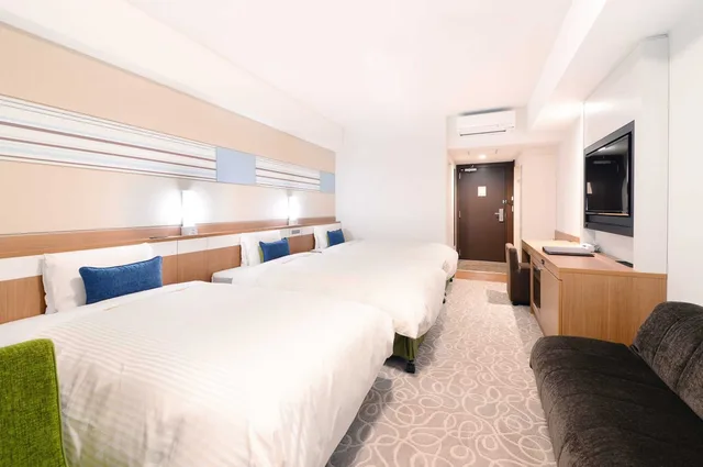 غرفة قياسية ثلاثية بسريرين منفصلين وثلاثة أسرّة بإطلالة على البحر في الملحق، Vessel Hotel Campana Okinawa 3/5