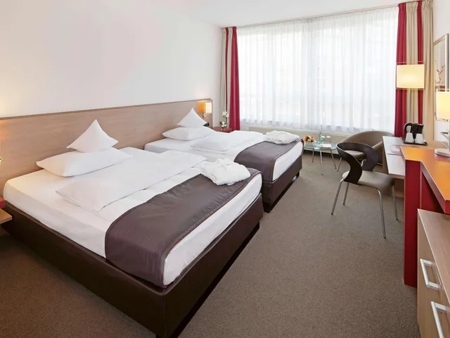 غرفة بريميوم بسريرين كوين، Movenpick Hotel Munster 1/1