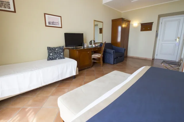 غرفة ثلاثية بسرير كينج وسرير فردي، Hotel Nuvo 4/9