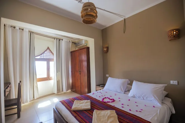 شقة عائلية بسرير كوين وسريرين فرديين، Bedouin Moon Hotel 1/3