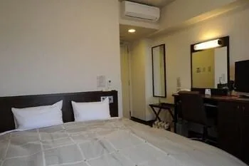 غرفة بسرير مزدوج بحمام خاص في المبنى الرئيسي للمدخنين، Hotel Route-Inn Iwakiizumi Ekimae 1/1