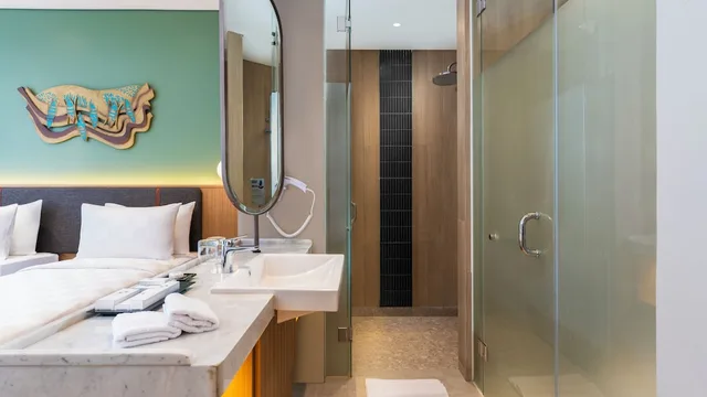 غرفة ديلوكس بسريرين منفصلين، Swiss-Belinn Indramayu 3/4