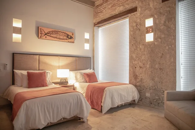 شقة ديلوكس بسرير كينج وسريرين منفصلين بشرفة بغرفتي نوم مع أريكة، CASA CLAVER LOFT BOUTIQUE HOTEL 2/9