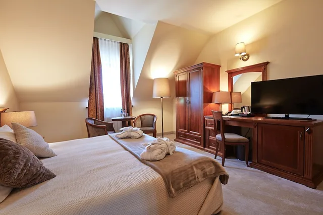 غرفة قياسية ثلاثية بسريرين منفصلين مع أريكة، Grand Hotel Stamary Wellness Spa 1/3