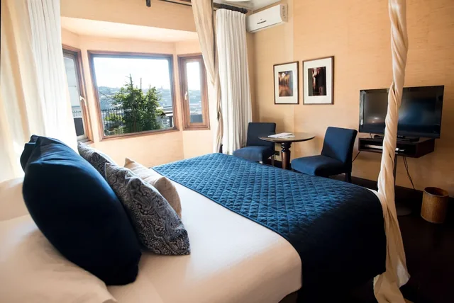 غرفة بريميوم بسرير كينج، Casa Higueras - Adults Only 2/3