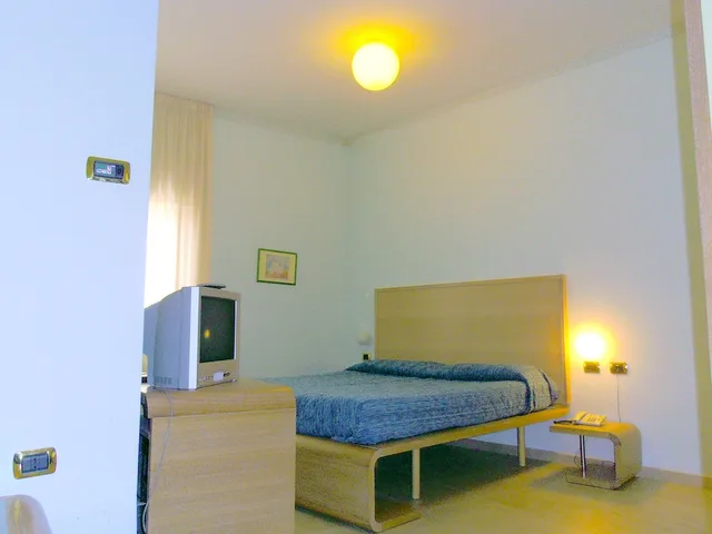 غرفة ثلاثية بسرير فردي، Hotel Villa Carolina 1/1