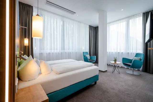 غرفة عائلية بسرير كوين وسريرين فرديين، Avalon Bad Reichenhall 3/5