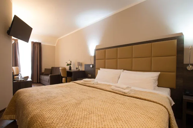 غرفة عائلية بسريرين كوين، Hotel Delta am Potsdamer Platz 1/2