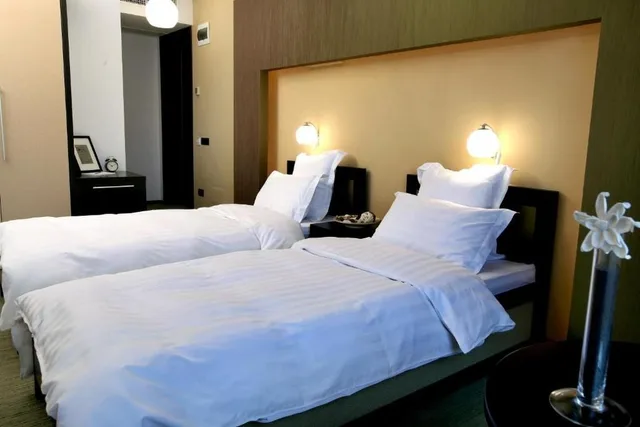 غرفة بسريرين منفصلين، Ambiance Hotel 3/4