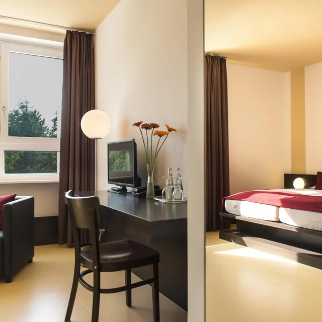 غرفة بسرير مزدوج بإطلالة على الحديقة، TOP EMBRACE Hotel Grenzfal 3/4