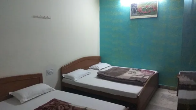 Family, 2 Double Beds, with Fan، Hotel Ganga Kripa 2/2