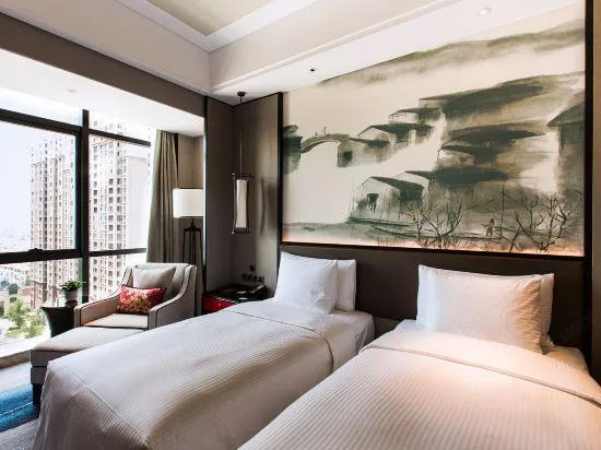 غرفة ديلوكس بسريرين، WANDA REALM YIWU 1/4