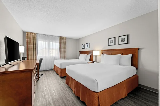 غرفة ديلوكس بسريرين كوين، Travelodge Suites by Wyndham Regina / Eastgate Bay 1/8