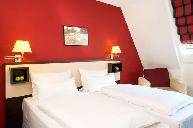 شقة بسريرين منفصلين مع أريكة، Nh Wien City 2/5