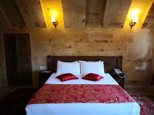 غرفة ديلوكس بسرير كوين بشرفة، Roc Of Cappadocia 1/4