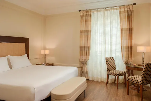Suite, Double Bed, Sofa, UNAHOTELS Deco Roma 1/10