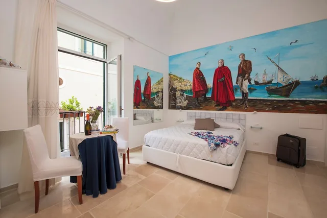 غرفة عائلية رباعية بسرير كوين بإطلالة على المدينة بشرفة بغرفة نوم واحدة مع أريكة، Hotel Antica Repubblica 10/10