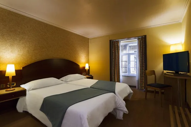 غرفة قياسية بسرير مزدوج أو سريرين منفصلين، Internacional Hotel 1/3