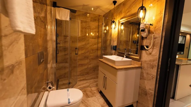 غرفة ديلوكس بسرير كينج وسرير كوين مع أريكة، Mas Suites Nisantasi 4/5