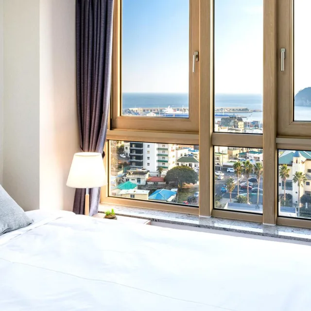 غرفة عائلية بسريرين منفصلين بإطلالة على البحر، Shin Shin Hotel Seogwipo 9/10