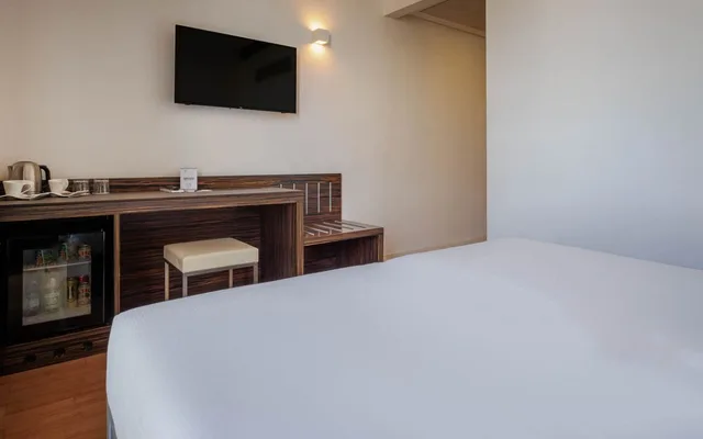 غرفة اقتصادية بسرير كوين، iH Hotels Milano Centrale 4/6