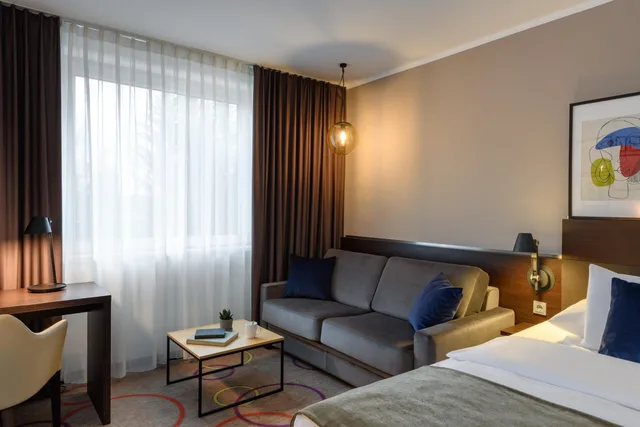 غرفة عائلية ثلاثية مع أريكة، Leonardo Hotel Hannover Medical Park 6/8