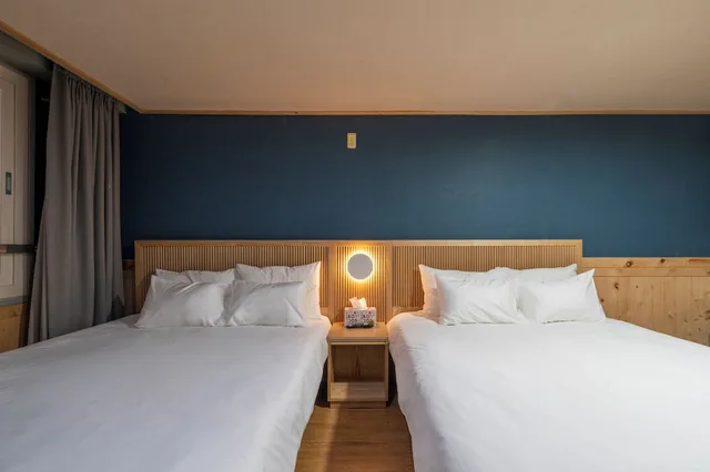 غرفة رباعية بسريرين كوين، New Jeju Hotel 3/9