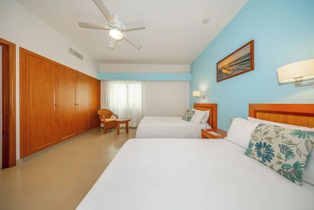 2 Bedrooms, Riviera, 1 King and 2 Double Beds, Garden View، Riviera Maya Suites 9/10