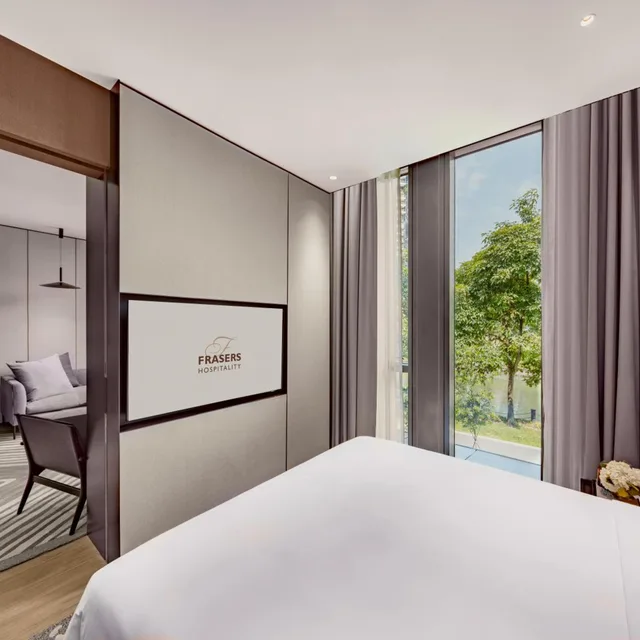 غرفة ديلوكس بسرير كينج بغرفة نوم واحدة مع دخول الصالة، Fraser Residence River Promenade Singapore 1/3