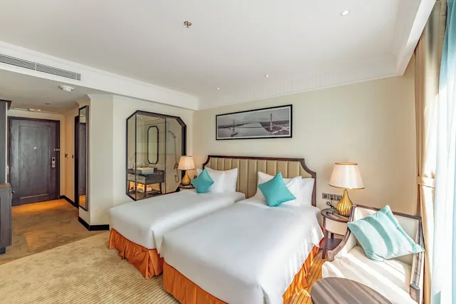 غرفة ديلوكس بسريرين منفصلين بإطلالة على المدينة، Charmant Suites a Boutique Hotel Can Tho 2/4