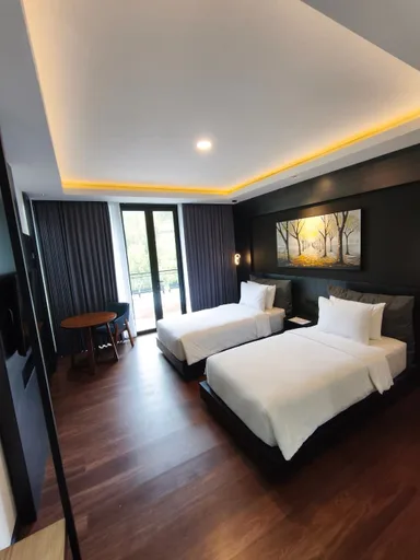 غرفة سوبيريور بسريرين منفصلين، Manis Ae Hotel Cabin & Resto Bromo 1/3