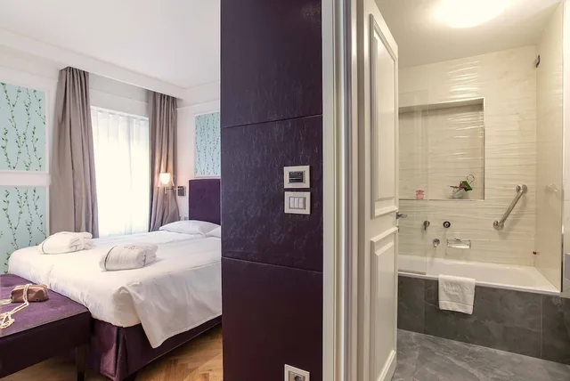 غرفة كلاسيكية بسرير كوين، Damaso Hotel 5/6
