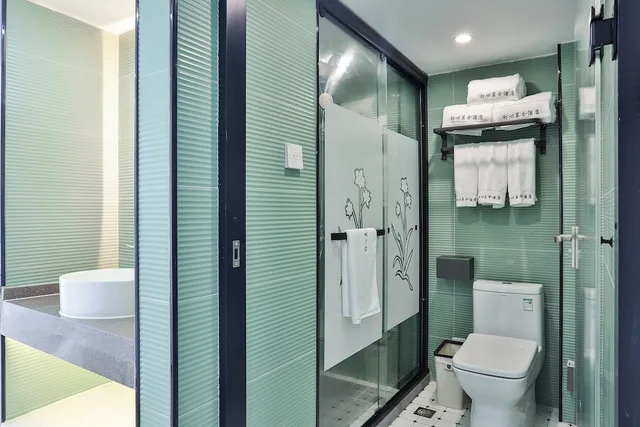 غرفة رومانسية بسريرين منفصلين وسرير كوين، Chuxin Moshe Hotel 2/2