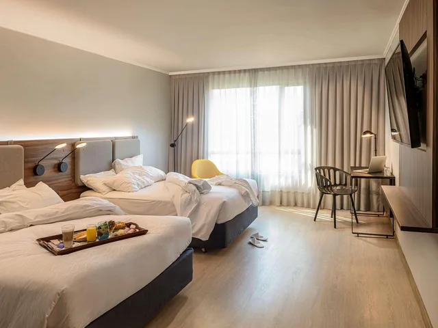غرفة بسرير كينج، Novotel Santiago Las Condes 1/3