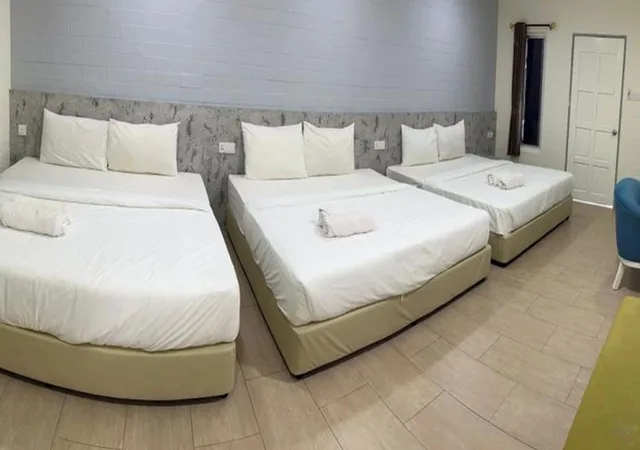 Superior, 3 King Beds, Pool View, Dlima Beach Inn 1/6