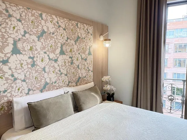 غرفة بسرير مزدوج أو سريرين منفصلين بإطلالة، Hotel Ginebra 2/8