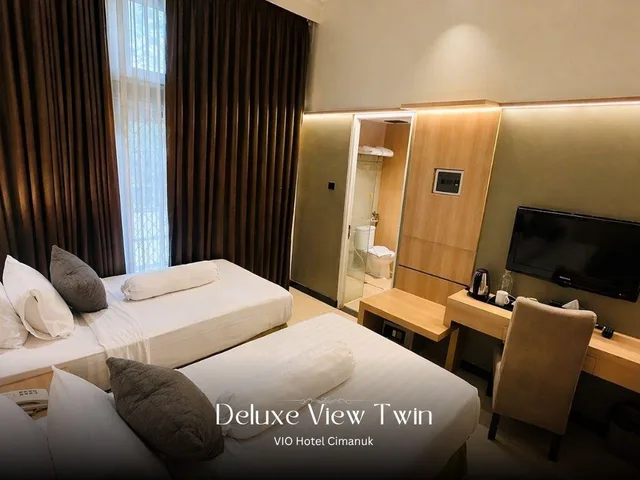 غرفة ديلوكس بسريرين منفصلين بإطلالة، Vio Cimanuk Hotel 1/2