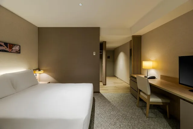 غرفة ديلوكس بسرير كوين بإطلالة على البحر في طابق مرتفع، The Square hotel Yokohama Minatomirai 1/4