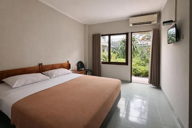 غرفة بسرير مزدوج بشرفة، Hotel Winotosastro Garden 1/8